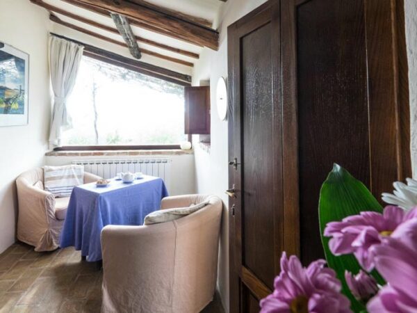 The Umbrian Country Cottages Stalla Dining Room with The Little Voyager