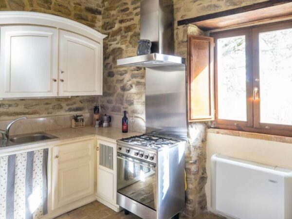 The Umbrian Country Cottages Kitchen with The Little Voyager