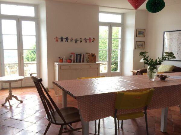 Dining table inside the main farmhouse at the French Gites