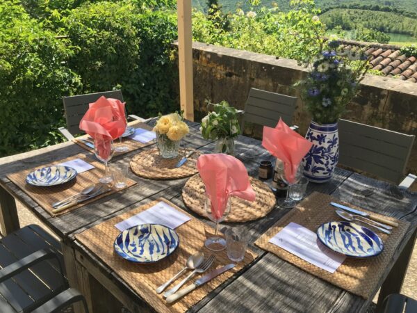 Outdoor seating area at the main Farmhouse at the French Gites