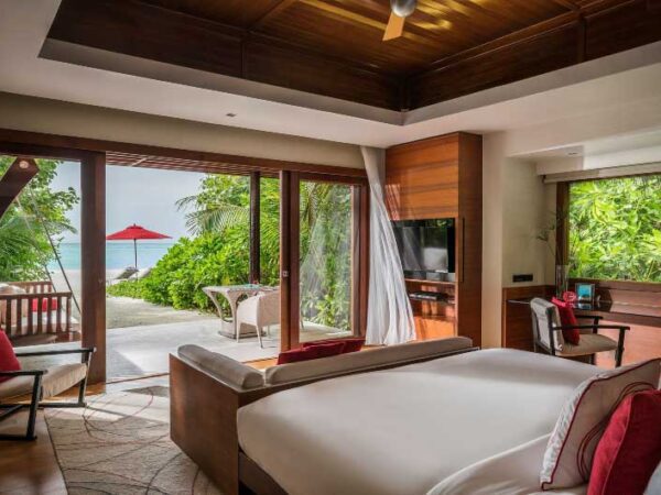 Niyama Private Islands Beach Villa Bedroom with The Little Voyager