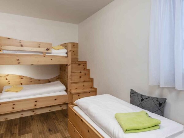 Bunk beds inside Chalet at the South Tyrolean Nature Resort