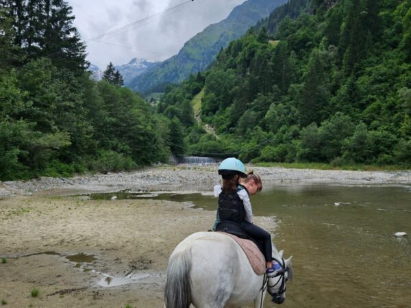 Girl on horse at the South Tyrolean Nature Resort