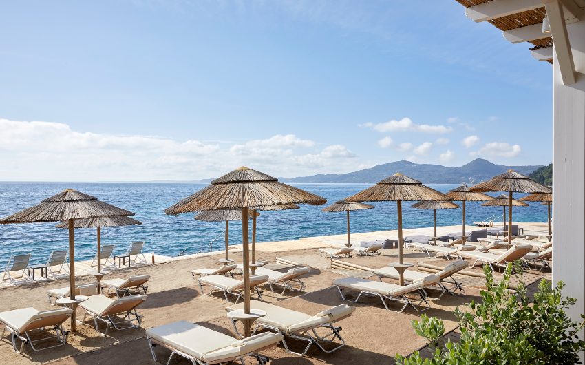 private beach with parasols