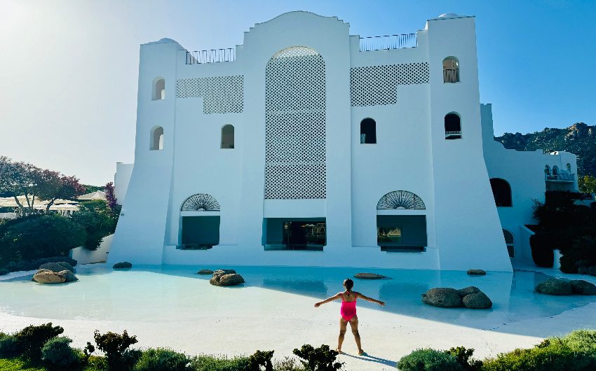 Girl in front of building at Falkensteiner Resort Capo Boi